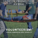 volunteers carrying stretchers with volunteer patients